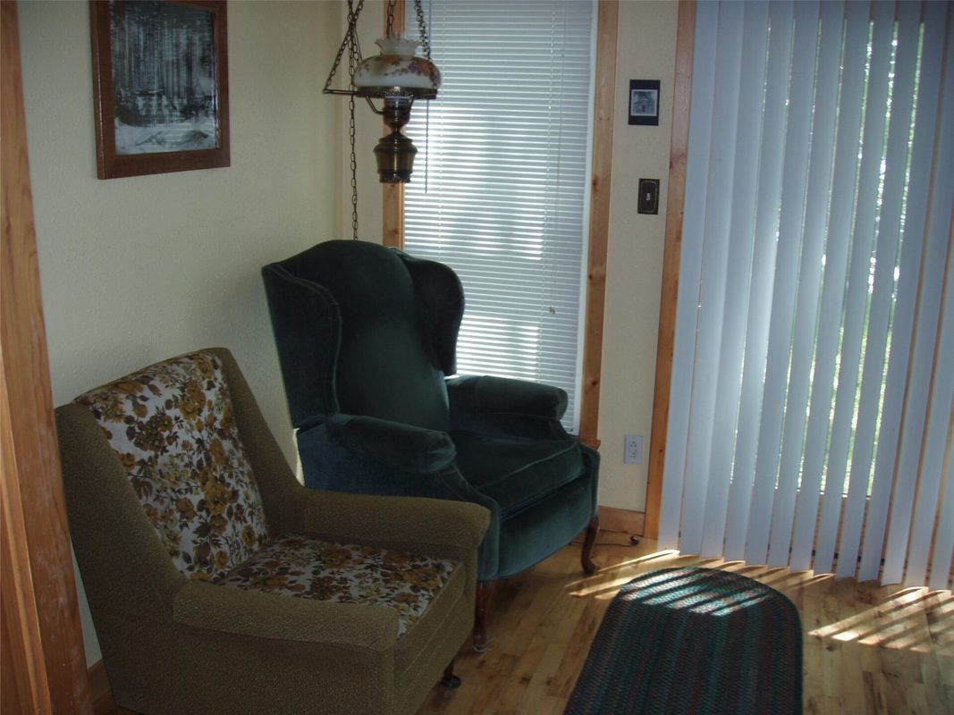 W11049 N LeTourneau Lake Road, Park Falls WI 54552 - living room seating by entry