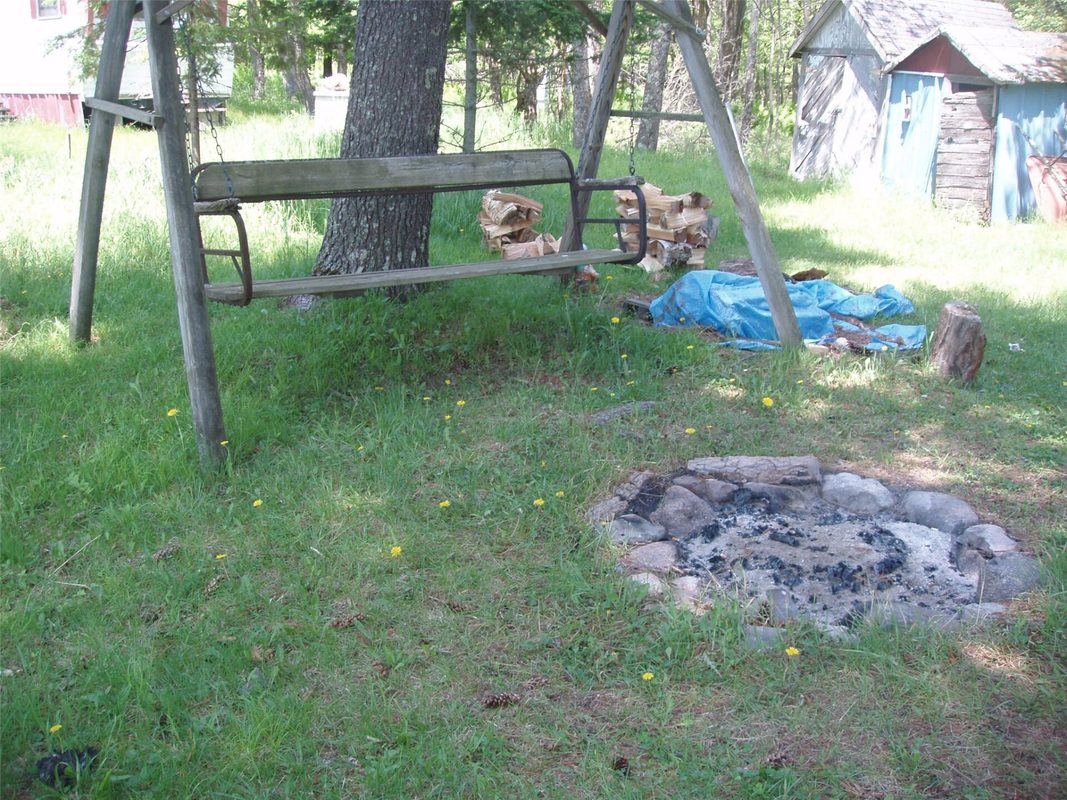 W11049 N LeTourneau Lake Road, Park Falls WI 54552 - fire pit and yard swing